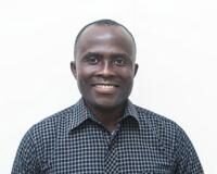 Ghanaian Scholar Dr Kwame Adom Promoted to Full Professor of Business at Burman University